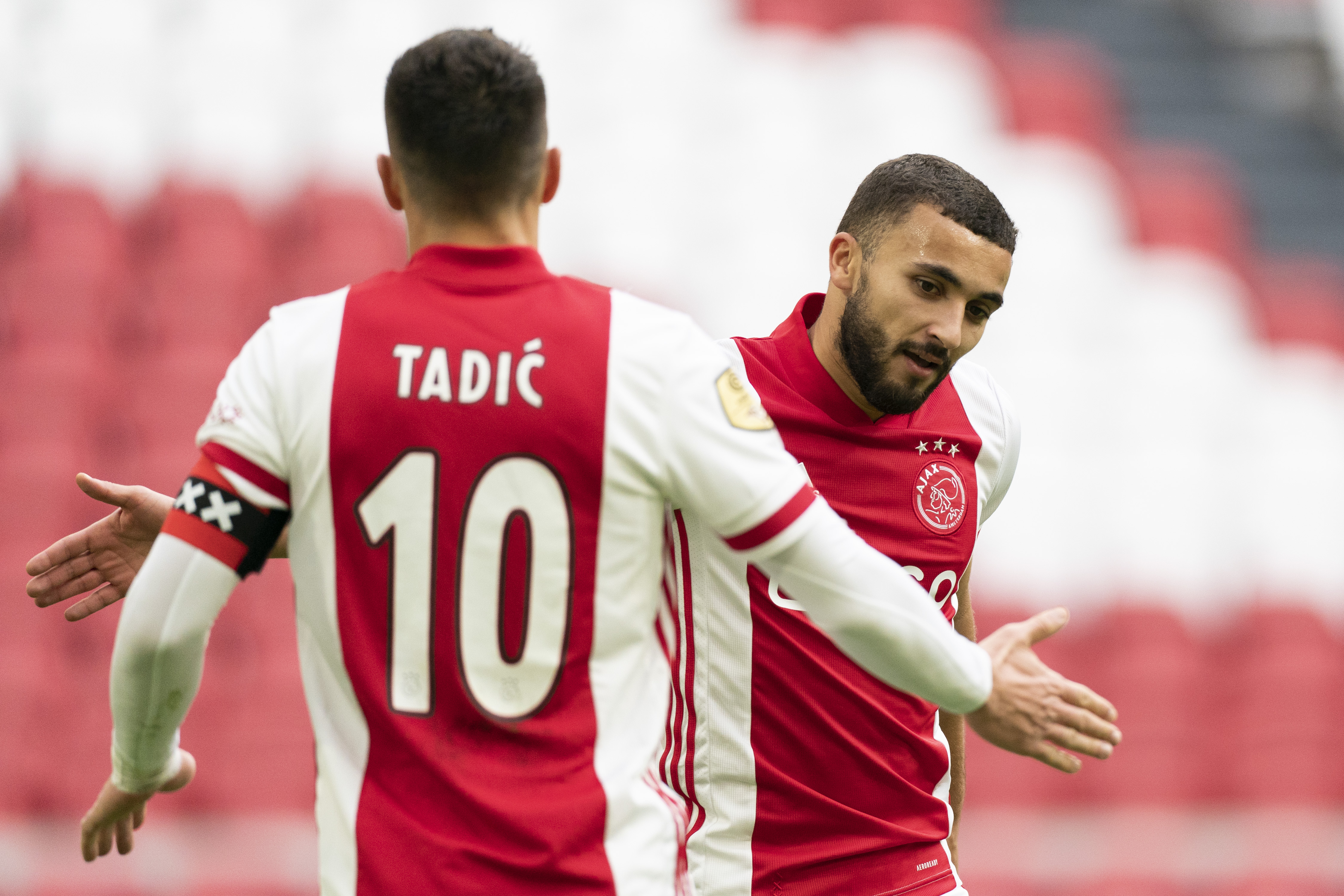 Tadic en Labyad feliciteren elkaar na de 5-0-winst op Heracles.